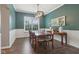 Elegant dining area features a modern chandelier and plenty of natural light at 427 Quincy Pl, Westfield, IN 46074