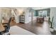 Open floor plan with dining area leading to office and staircase at 427 Quincy Pl, Westfield, IN 46074