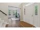 Bright foyer adjacent to front office and featuring hardwood floors and contemporary design at 427 Quincy Pl, Westfield, IN 46074