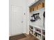 Functional mudroom features shelving, hooks and shoe storage near front door at 427 Quincy Pl, Westfield, IN 46074