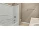 Bathroom featuring a tub and shower combination and a towel rack at 4295 Washington Blvd, Plainfield, IN 46168