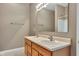 Double vanity bathroom featuring a large mirror and wood cabinets at 4295 Washington Blvd, Plainfield, IN 46168