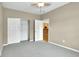 Bedroom features neutral carpet, neutral paint, and a closet at 4295 Washington Blvd, Plainfield, IN 46168