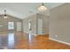 Hardwood floors and neutral paint provide warmth and brightness to this living room at 4295 Washington Blvd, Plainfield, IN 46168