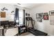 Office/bedroom combo with desk, computer, treadmill, and inspirational wall decor at 4380 Dunsany Ct, Indianapolis, IN 46254