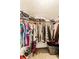 Spacious walk-in closet offers lots of clothing storage with multiple shelves and ample hanging space at 4380 Dunsany Ct, Indianapolis, IN 46254