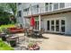 Spacious backyard featuring outdoor dining and patio seating area that is perfect for entertaining at 4443 Mallard Pt, Columbus, IN 47201