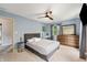 Comfortable bedroom with soft carpet, ceiling fan, and neutral tones, providing a calming atmosphere at 4443 Mallard Pt, Columbus, IN 47201