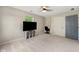 Neat bedroom with a large tv, desk, and lots of closet space, offering convenience and organization at 4443 Mallard Pt, Columbus, IN 47201