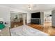 Open concept living room with hardwood floors and access to multiple rooms at 4443 Mallard Pt, Columbus, IN 47201