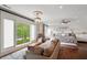 Spacious main bedroom retreat with large windows, comfortable seating area, and a serene atmosphere at 4443 Mallard Pt, Columbus, IN 47201