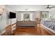Spacious main bedroom retreat with hardwood floors, comfortable seating area, and a serene atmosphere at 4443 Mallard Pt, Columbus, IN 47201