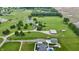 Aerial view of the property featuring lush green pastures, ponds, and horse training track at 4670 N 600 E, Franklin, IN 46131