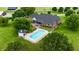 Aerial view of home featuring a swimming pool and a lush backyard with mature trees at 4670 N 600 E, Franklin, IN 46131