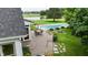 Relaxing backyard with swimming pool, deck and stone fire pit area at 4670 N 600 E, Franklin, IN 46131