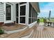 Deck on the exterior features an enclosed porch and outdoor seating at 4670 N 600 E, Franklin, IN 46131