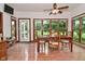 Casual dining room with hardwood floors and large picture windows overlooking the backyard at 4670 N 600 E, Franklin, IN 46131