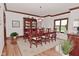 Elegant dining room with hardwood floors, chandelier, and a charming built-in window bench at 4670 N 600 E, Franklin, IN 46131