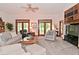 Relaxing living room featuring plush seating, a ceiling fan, and views to the outdoor living at 4670 N 600 E, Franklin, IN 46131