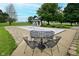In-ground pool with auto cover, dining area and pool house provides relaxing outdoor space at 4670 N 600 E, Franklin, IN 46131