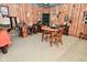 Interior of the tack room featuring a round table with chairs and western decorations at 4670 N 600 E, Franklin, IN 46131