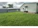 View of the home's backyard and detached garage at 4673 S 400 W, New Palestine, IN 46163