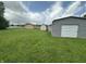 Sprawling backyard with several outbuildings/garages is featured at 4673 S 400 W, New Palestine, IN 46163