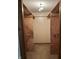A large walk-in closet has lots of space for clothing at 4673 S 400 W, New Palestine, IN 46163