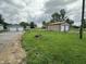 The property showcases a two-car garage and shed in a large lawn at 4673 S 400 W, New Palestine, IN 46163