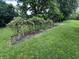 Image showcases a lovely trellis in the backyard at 4673 S 400 W, New Palestine, IN 46163