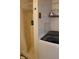Tiled bathroom featuring shower, toilet and washing machine at 515 Hawthorne Ave, Anderson, IN 46011