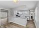 Modern kitchen featuring white cabinets, granite countertops, and stainless steel appliances at 5367 Penway St, Indianapolis, IN 46224