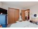 Inviting bedroom with closet space, a dresser and soft textures throughout at 5515 Gateridge Ln, Indianapolis, IN 46237
