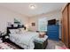 Comfortable bedroom features plush bedding, soft decor, and closet space at 5515 Gateridge Ln, Indianapolis, IN 46237