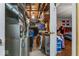 An unfinished basement features open rafters, exposed pipes, and a furnace at 5614 Regency Dr, Indianapolis, IN 46224