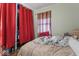This bedroom features a closet with red curtain at 5614 Regency Dr, Indianapolis, IN 46224