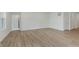 Bright bedroom featuring wood flooring, neutral walls, and natural light from the window at 5673 Stetson Dr, Whitestown, IN 46052