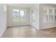 Sunlit room with big windows and hardwood floors at 5673 Stetson Dr, Whitestown, IN 46052