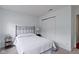 A nicely sized bedroom offers a full-sized bed and closet at 5857 Stone Pine Trl, Carmel, IN 46033