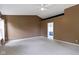 Large bedroom with plush carpet, two windows, and adjoining bathroom at 5857 Stone Pine Trl, Carmel, IN 46033