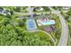 A vibrant community pool, tennis court, and playground enhance the neighborhood's appeal at 5857 Stone Pine Trl, Carmel, IN 46033