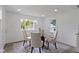 Cozy dining area with table, chairs, and neutral color palette at 6833 Evanston Ave, Indianapolis, IN 46220