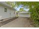 View of the detached two-car garage next to the home at 6833 Evanston Ave, Indianapolis, IN 46220