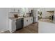 Well-equipped kitchen with stainless steel appliances, a modern faucet, and ample counter space at 6833 Evanston Ave, Indianapolis, IN 46220