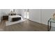 Bright main bedroom with access to the exterior patio at 6833 Evanston Ave, Indianapolis, IN 46220
