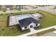 Aerial view of a community pool with a clubhouse and lounge chairs for residents at 6842 Jacone Dr, Brownsburg, IN 46112