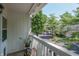 Balcony offers a serene outdoor space with green tree and community views at 6920 Wesley Ct, Indianapolis, IN 46220