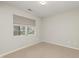 This bedroom features neutral walls and carpet with a window at 6920 Wesley Ct, Indianapolis, IN 46220