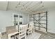 Dining room featuring stylish lighting, a table set, and a decorative bookshelf at 6920 Wesley Ct, Indianapolis, IN 46220
