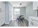 Eat-in kitchen features a round table with chairs, natural light, and stylish flooring at 6920 Wesley Ct, Indianapolis, IN 46220